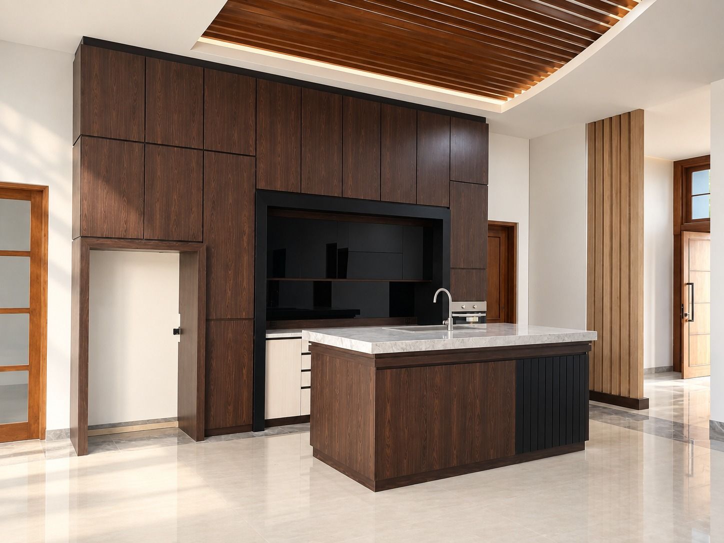 Dapur dengan kabinet kayu gelap setinggi plafon dan island berlapis meja batu putih di rumah yang belum berisi perabot.